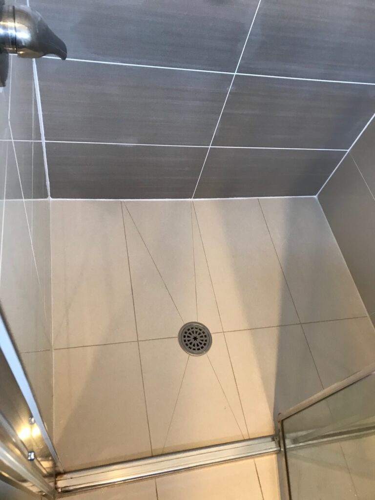 Shower tiling repair job with prices